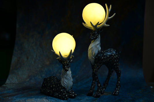 Celestial Antler Reindeer – Elegant Black & Pearl Figurine Set