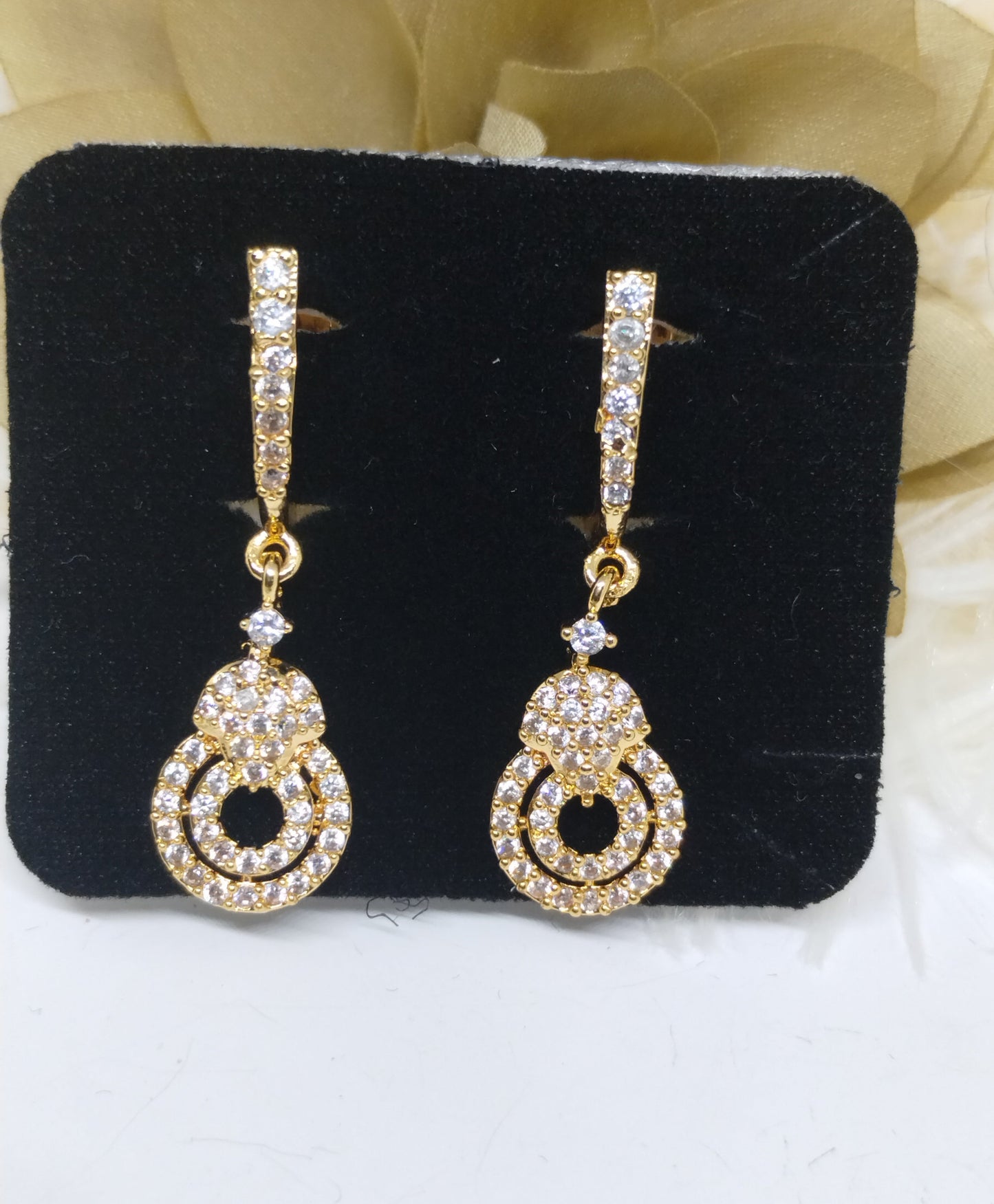 Ethereal Glow American Diamond Dangler Earrings
