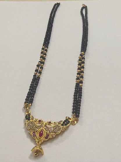 Black Bead Temple Necklace with Ruby Accent Pendant