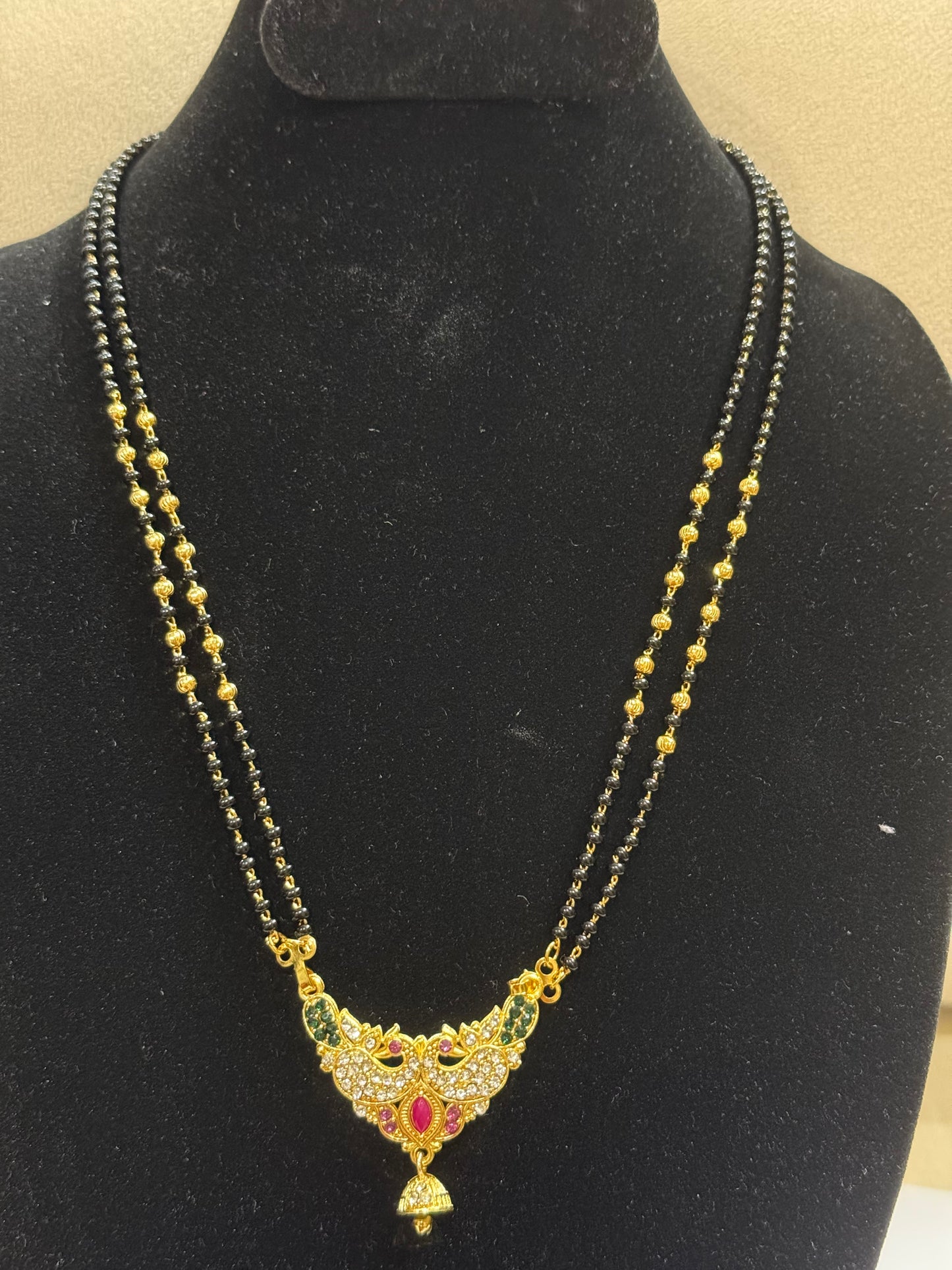 Black Bead Temple Necklace with Ruby Accent Pendant