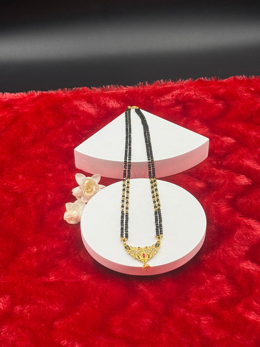Black Bead Temple Necklace with Ruby Accent Pendant