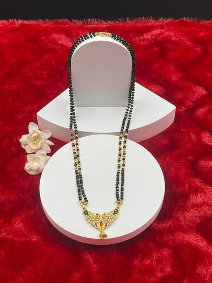 Black Bead Temple Necklace with Ruby Accent Pendant